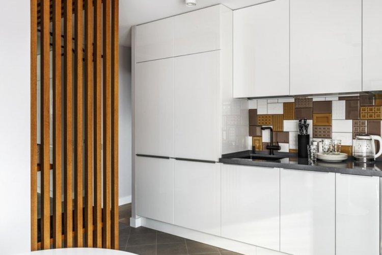 Lit gigogne dans le podium - Studio design d'appartement