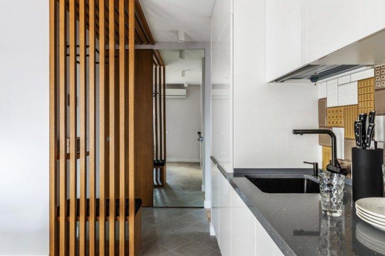 Lit gigogne dans le podium - Studio design d'appartement