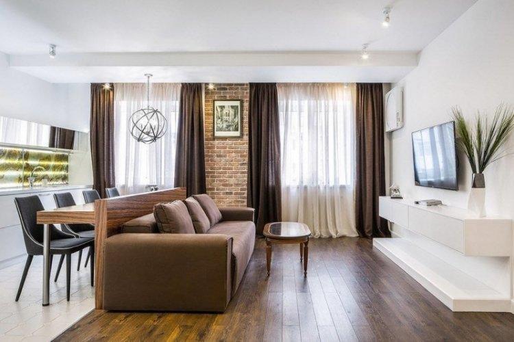 Cuisine-salon dans un style moderne - photo de design d'intérieur