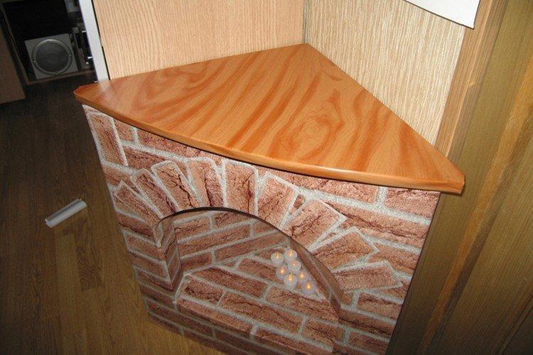Fausse cheminée d'angle avec vos propres mains