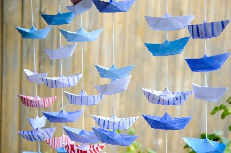 Comment décorer un bateau en papier de vos propres mains