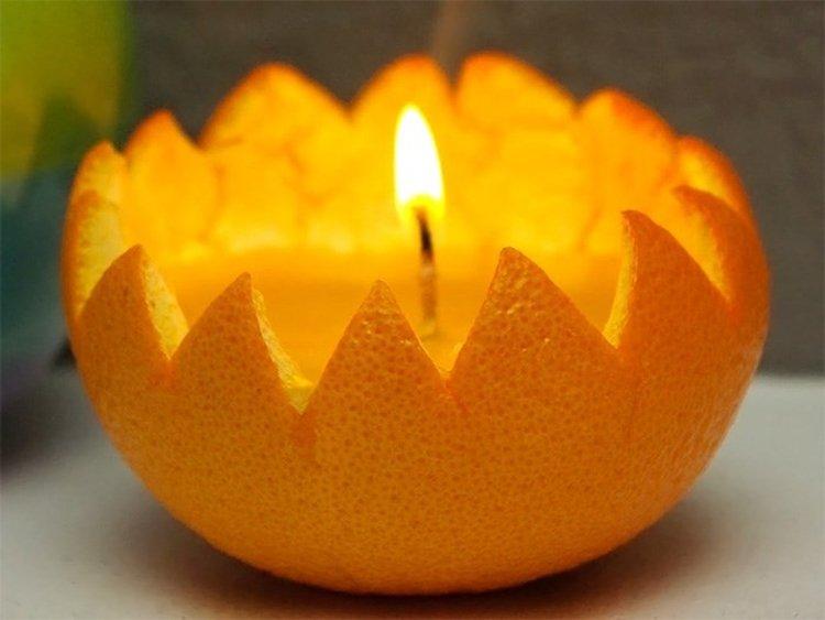 Bougies de Noël aux agrumes - Comment décorer un appartement pour le Nouvel An 2020