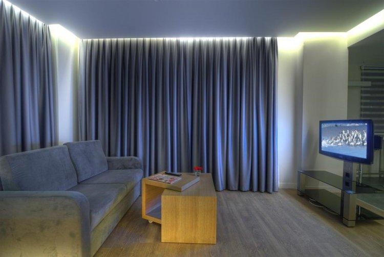 Rideaux hauts - Comment agrandir visuellement la pièce