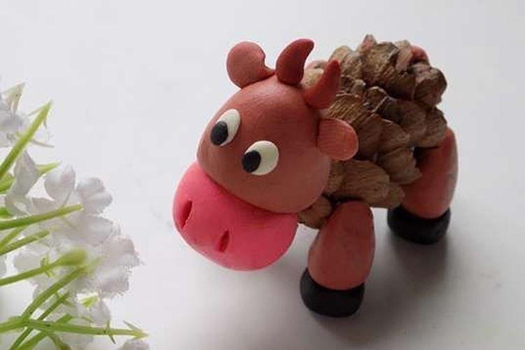 Gobie de pomme de pin - artisanat pour le nouvel an pour les enfants