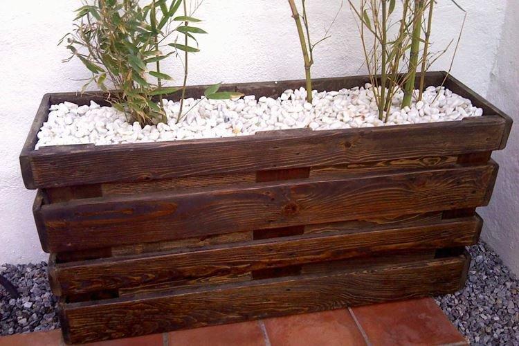 Stand pour fleurs - Mobilier de jardin en palettes pour donner une photo