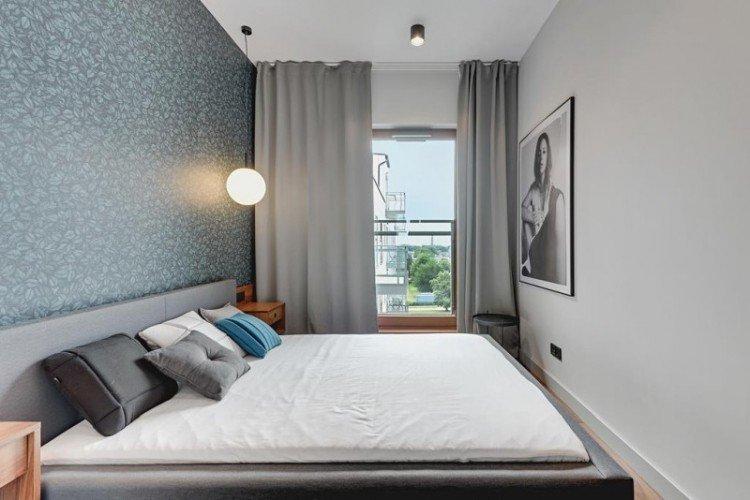 Intérieur de la chambre 10 m² dans un style scandinave - photo