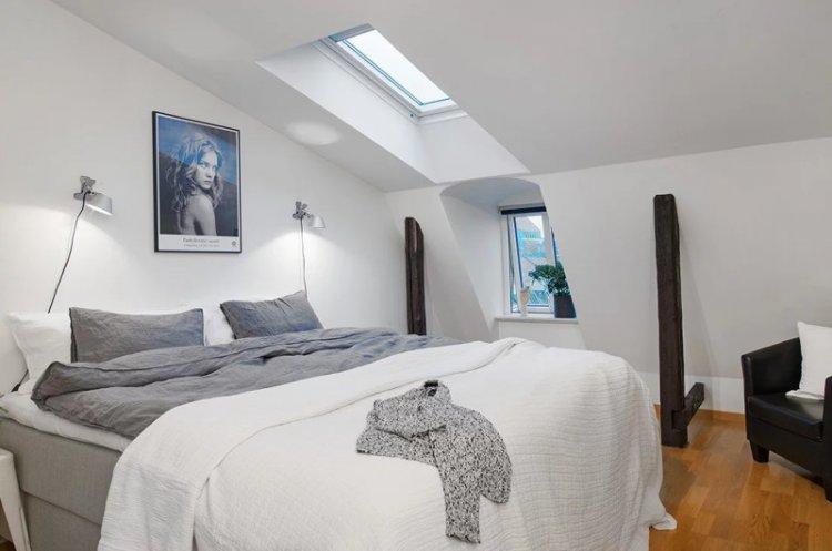 Chambre mansardée de style scandinave - photo de design d'intérieur