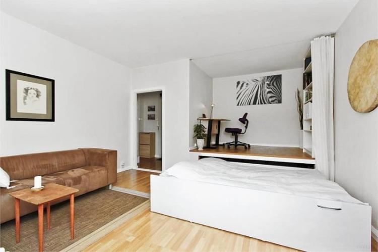 Zonage d'une pièce en une chambre et un salon - conception de photos